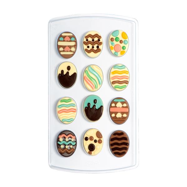 KIT STAMPI CIOCCOLATINI TERMOFORMATO UOVA 12 CAVITA' CON N.40 ADESIVI E BUSTINE 1 KIT STAMPI CIOCCOLATINI TERMOFORMATO UOVA 12 CAVITA' CON N.40 ADESIVI E BUSTINE